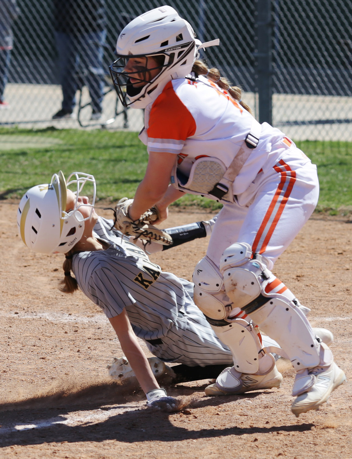 Lady Jacket catcher Jaycee Smith just after applying a tag to a Kaufman baserunner in action at the Canton tournament.
